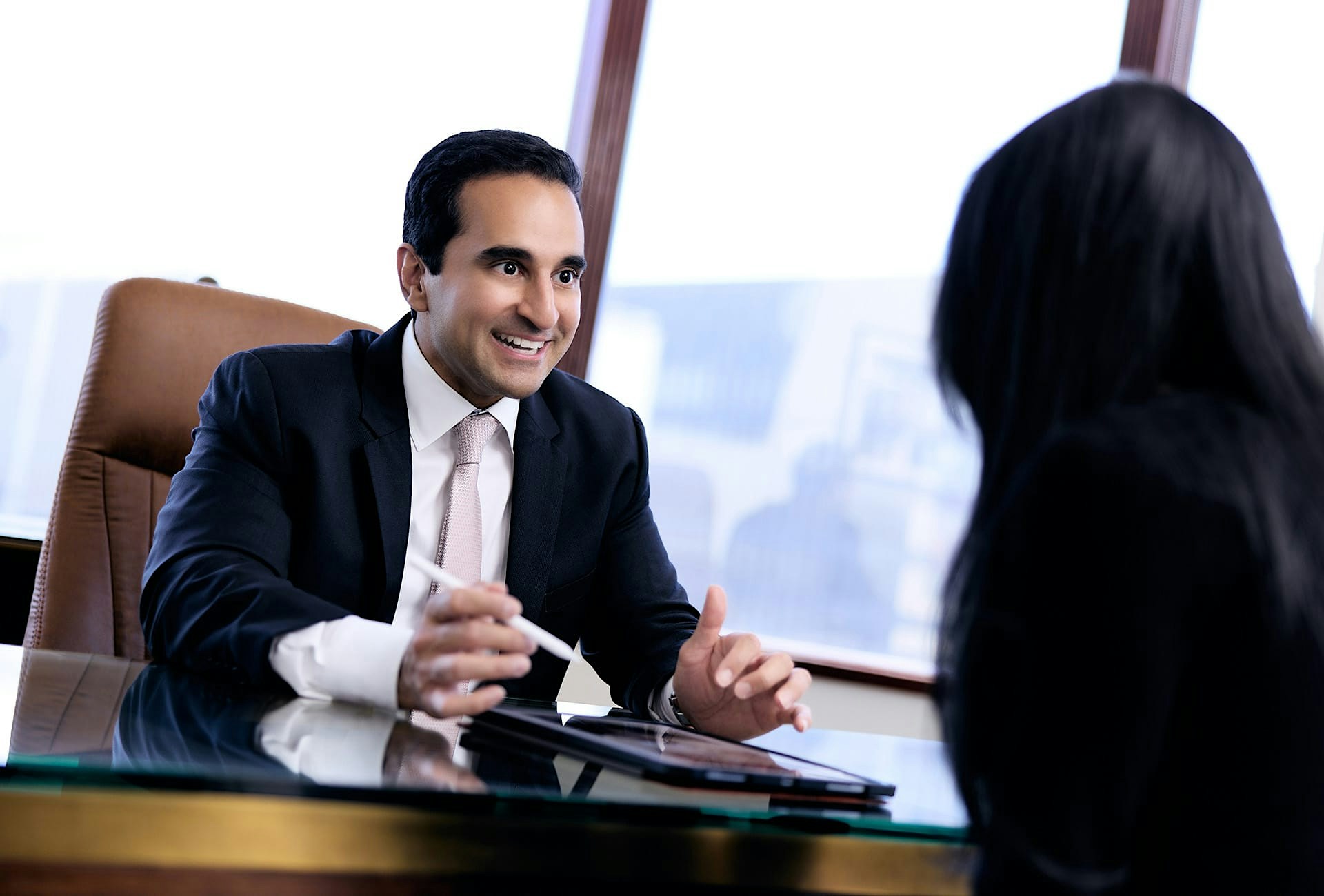Dr. Dugar smiling at a patient