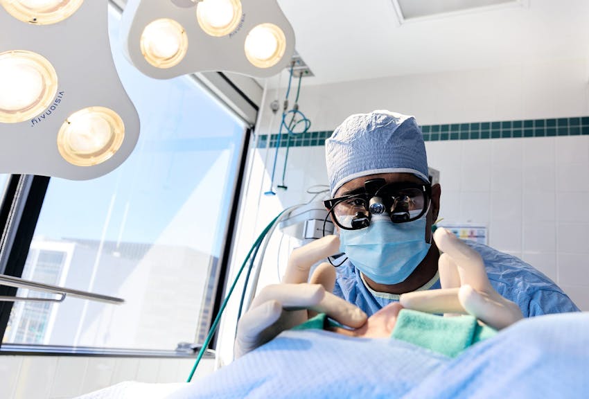 Dr. Dugar working on a patient's nose