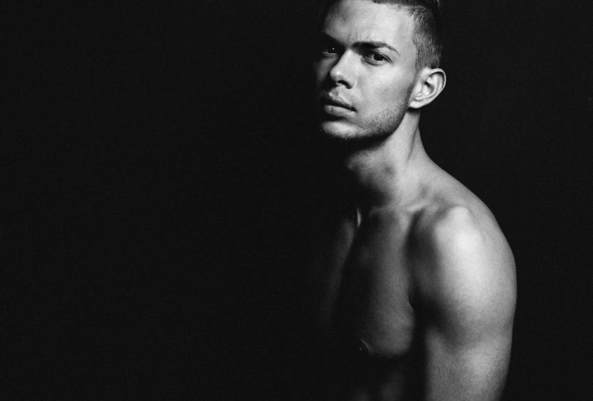 man looking over his shoulder