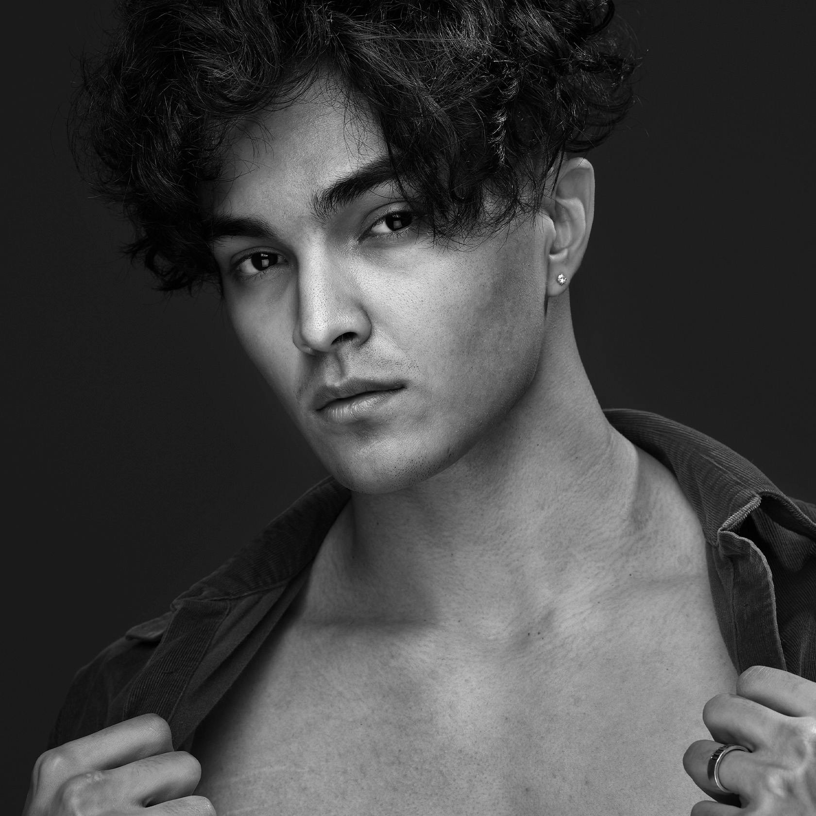 man sitting in front of a window