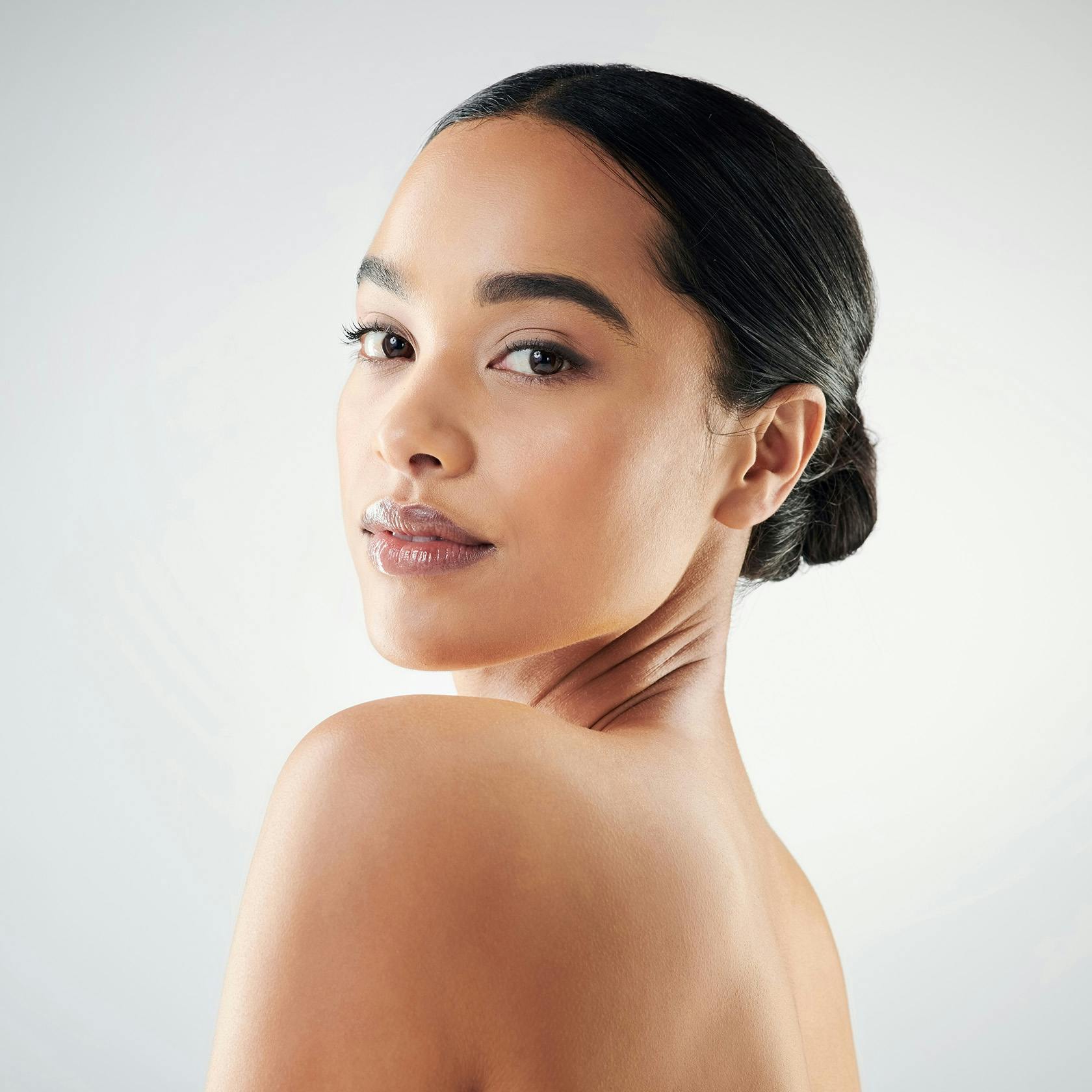 woman looking over her shoulder