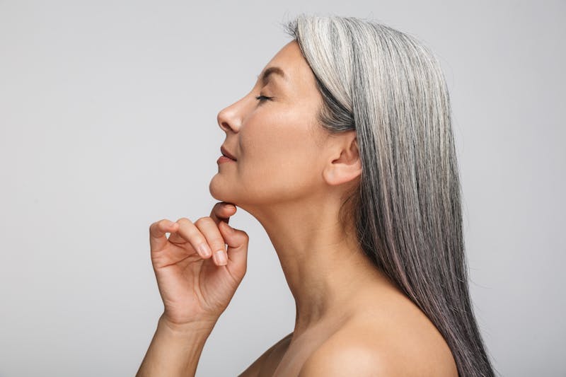 older woman showing profile