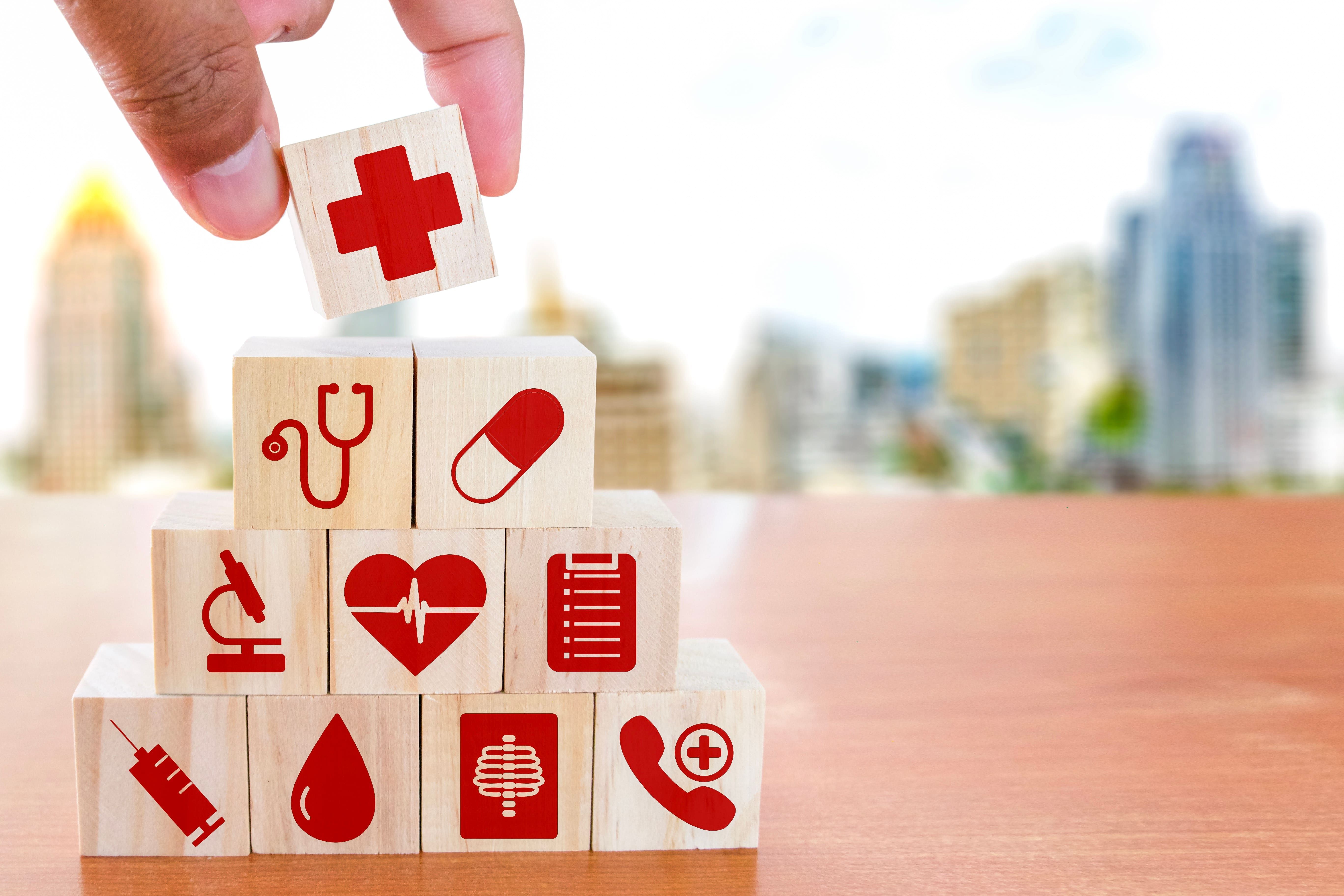 A set of stacking blocks that feature various health related symbols on them