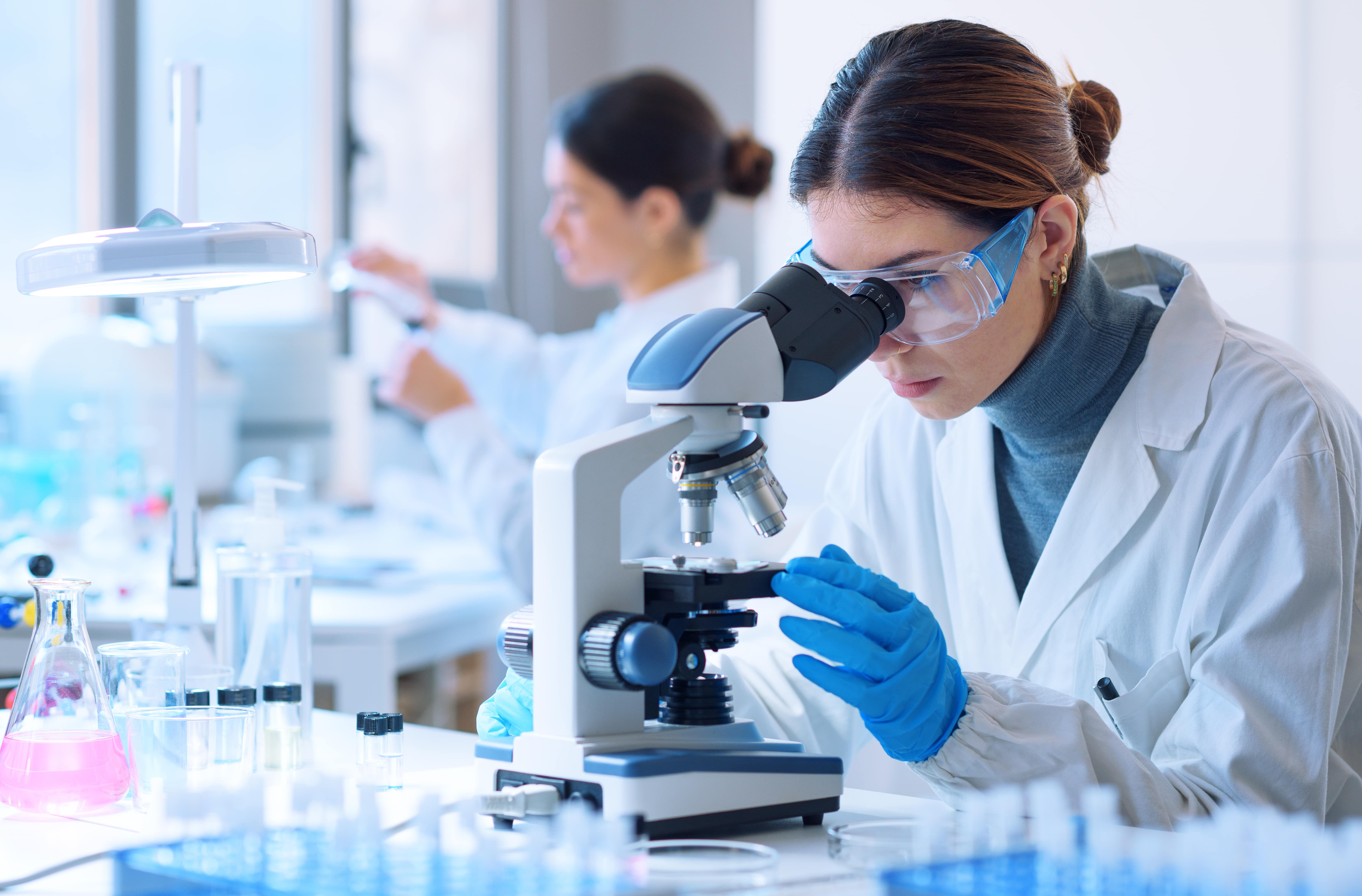 Scientists analysing gut test results