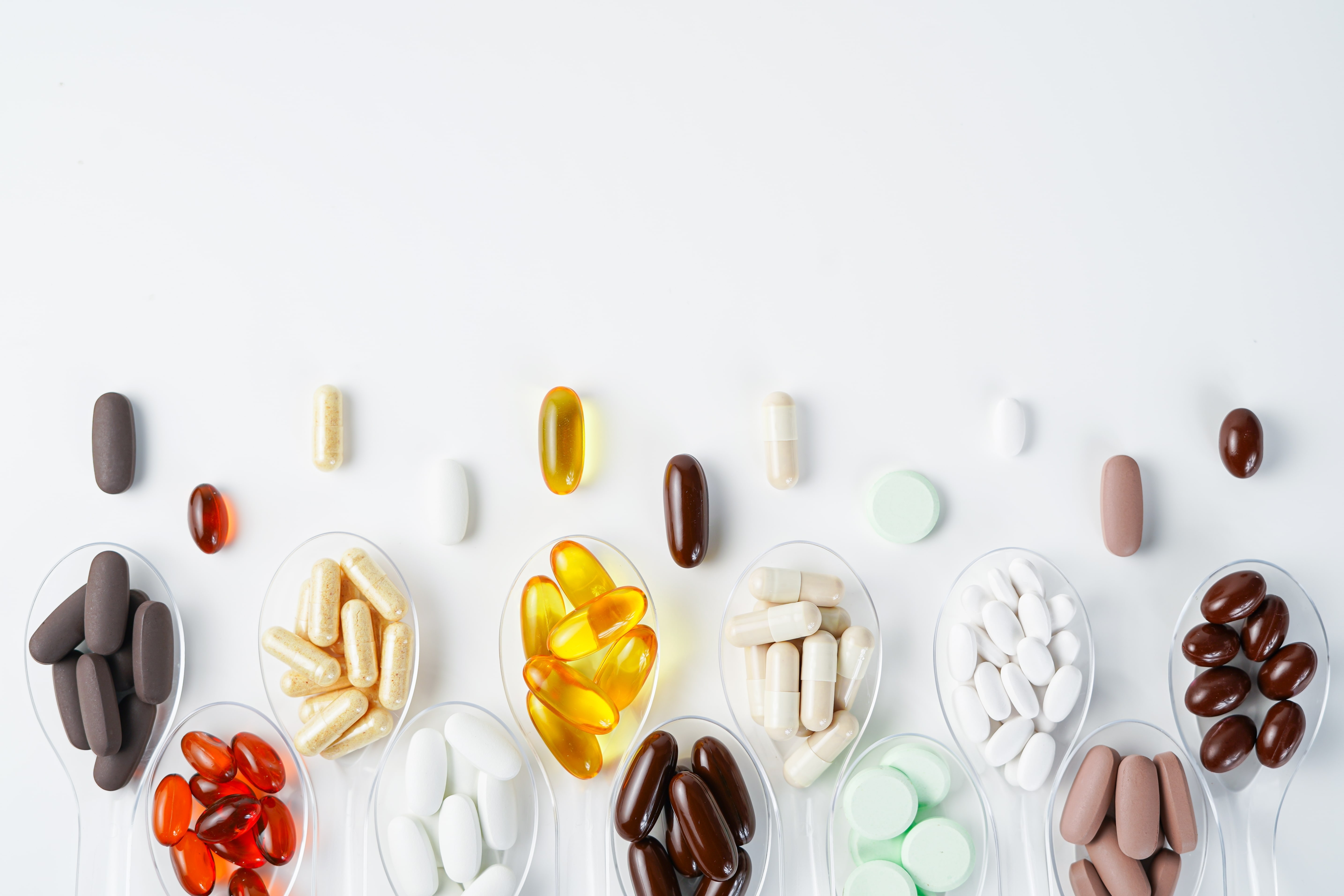 Various health supplements laid out on a table