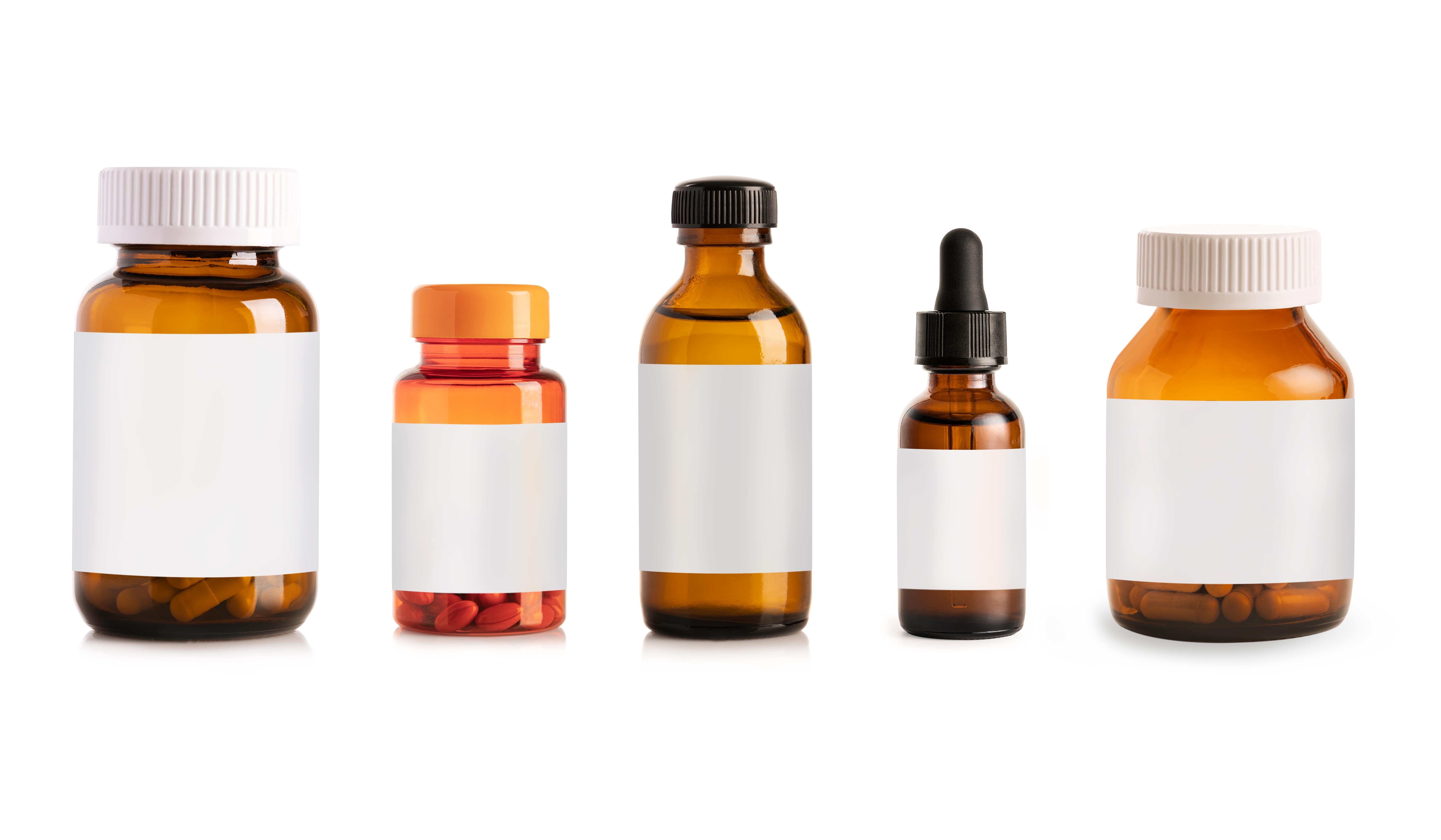 Different types of brown glass and plastic medicine bottles with blank labels, showing pill containers, liquid solutions, and a dropper bottle used for supplements such as NAD+, prescription or over-the-counter medications.