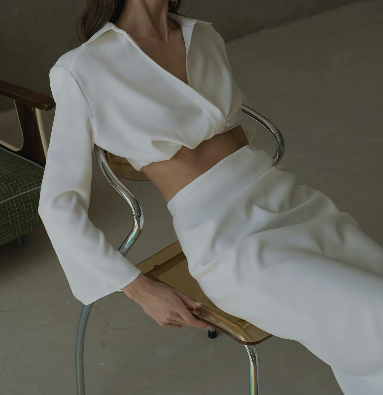 woman in a glamorous white outfit