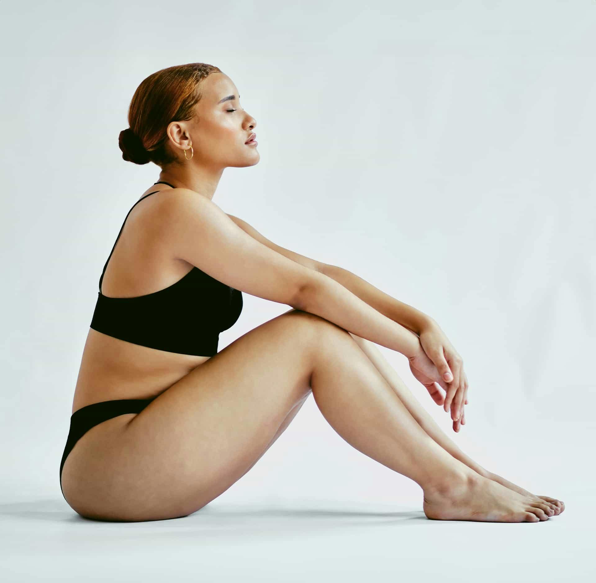 Woman sitting on floor