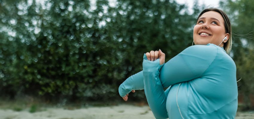Woman stretching outside