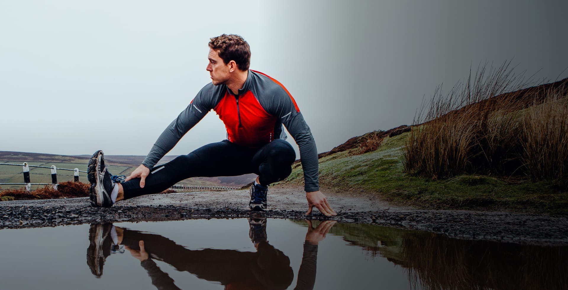 Man stretching in his workout clothes
