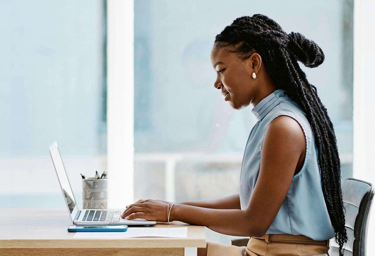 Woman sitting at a computer