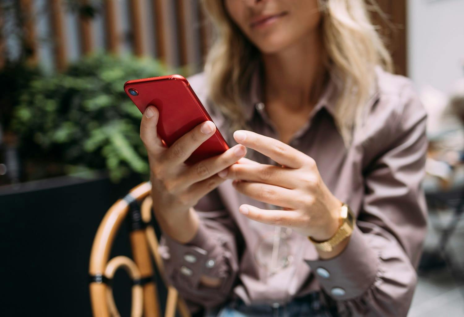 Woman on her red phone