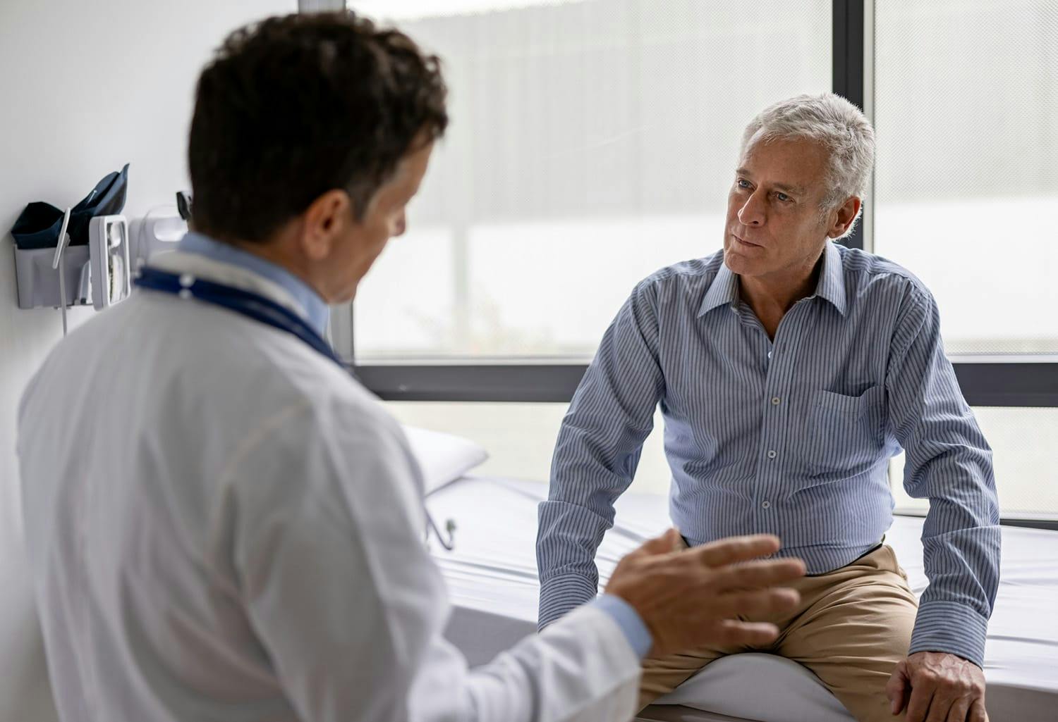 Man talking to a doctor