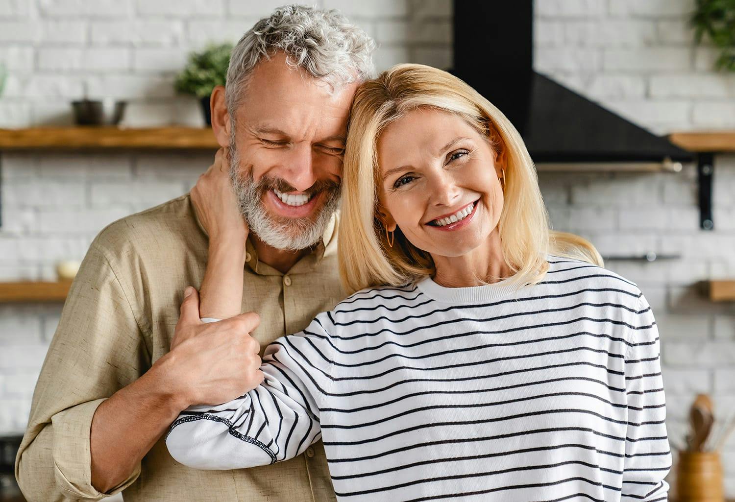 Man and woman embracing one another