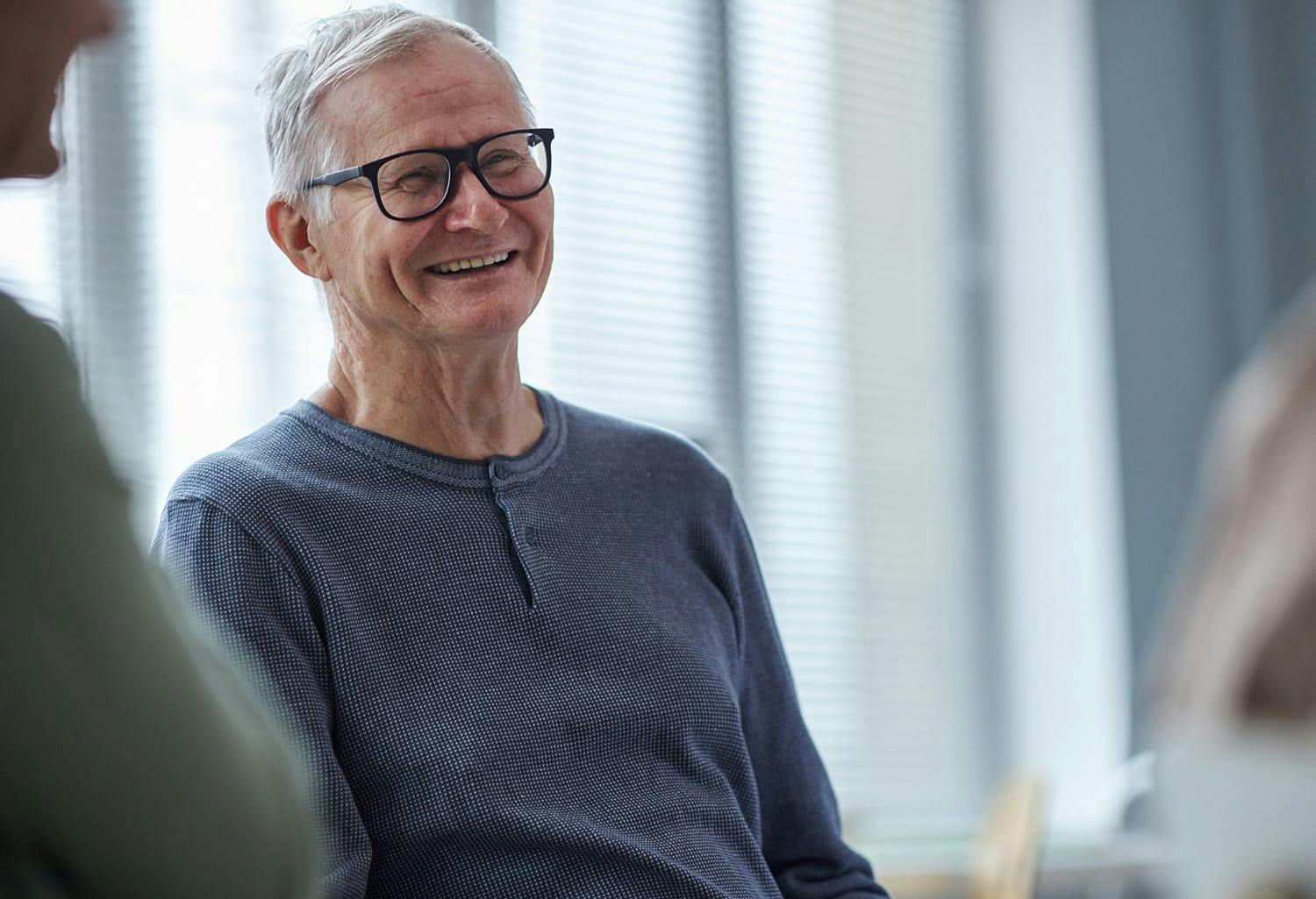 Man in glasses, smiling