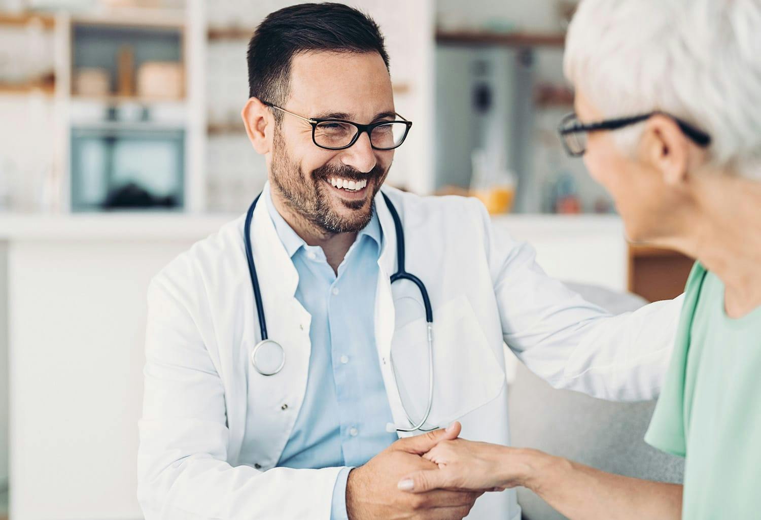 Doctor shaking a womans hand