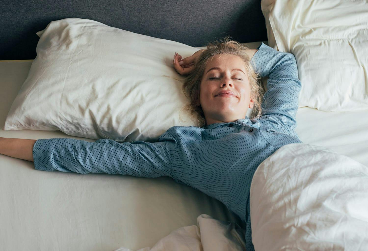 Woman laying in bed