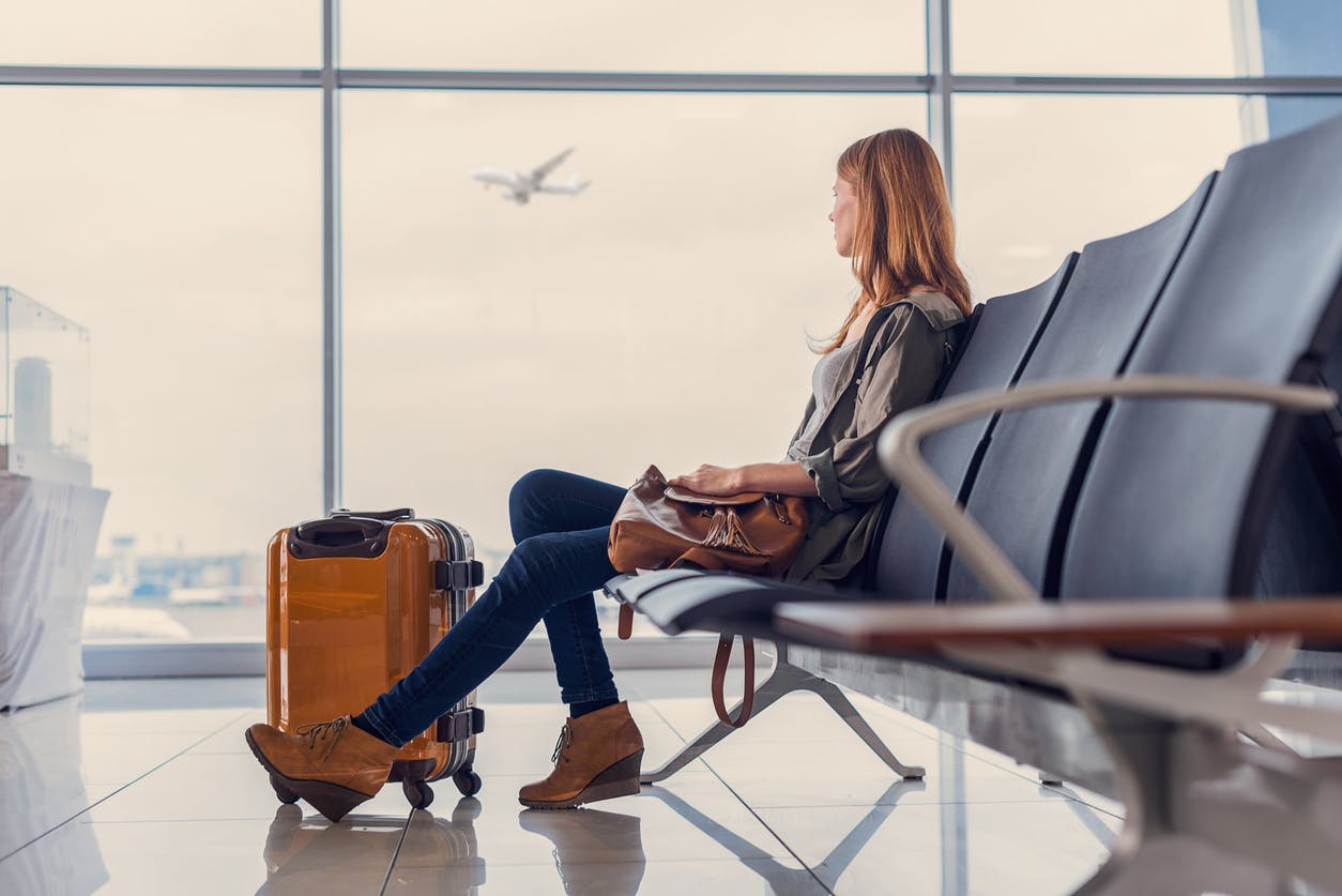 Woman sitting at an airport