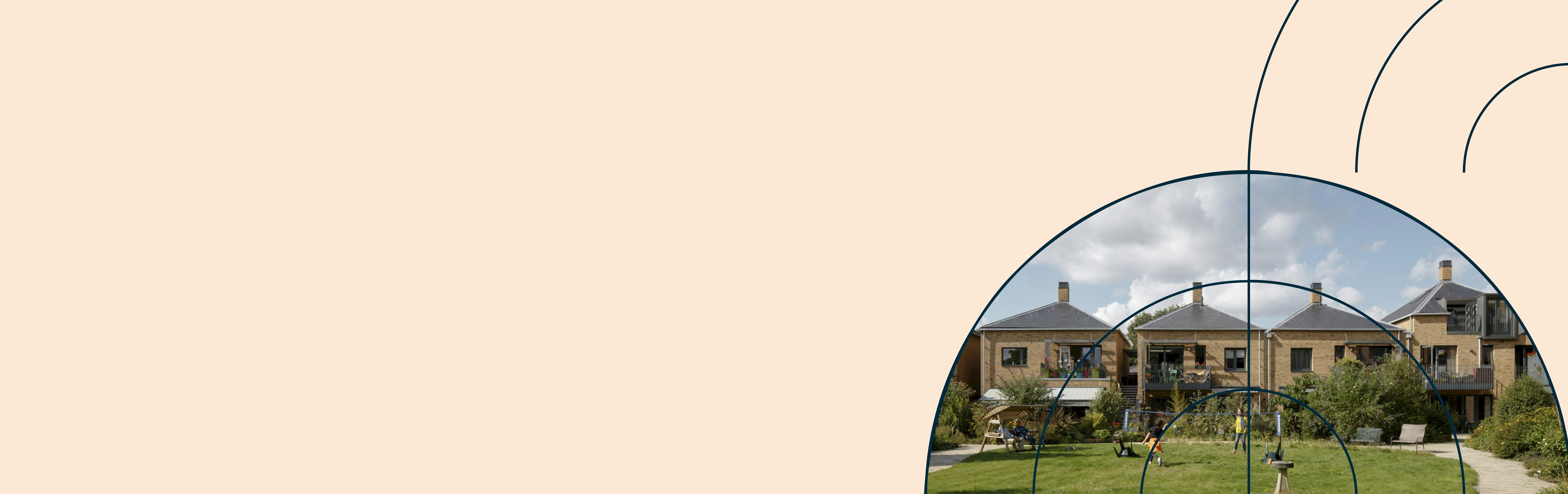 Row of houses and grass with people playing in a semi-circle