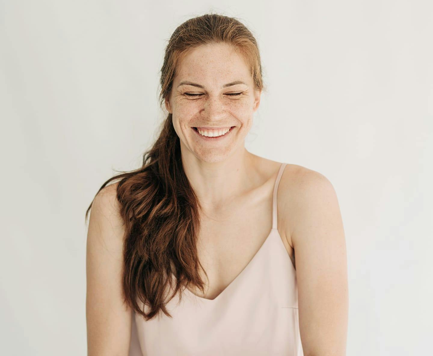 woman with side pony over her shoulder