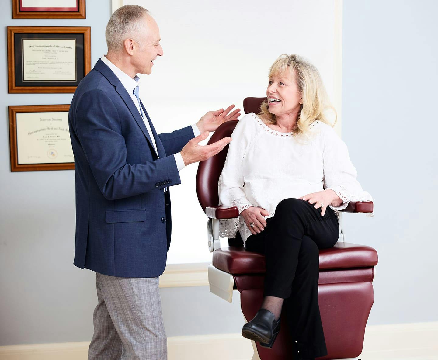 female patient speaking to Dr. Fechner as she sits