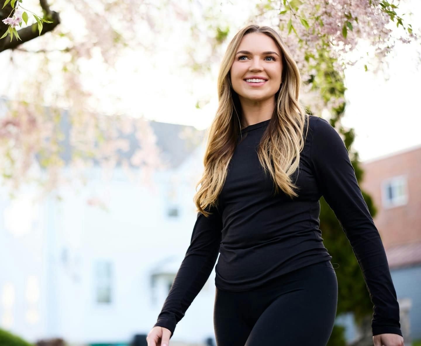 patient in all black clothing walking