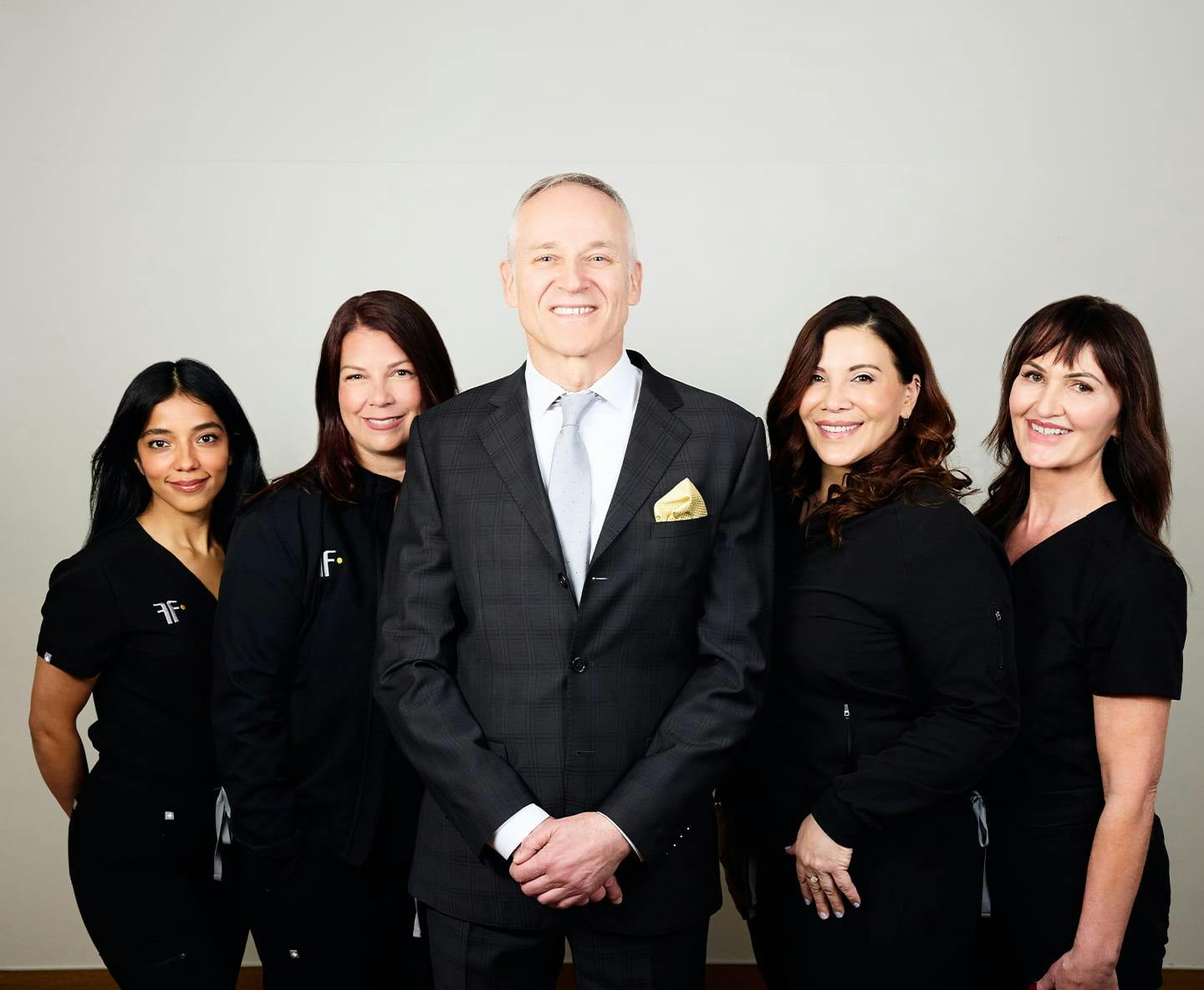 Dr Fechner with 4 of his team members