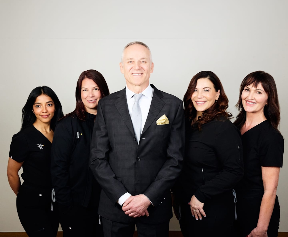 Dr Fechner with 4 of his team members