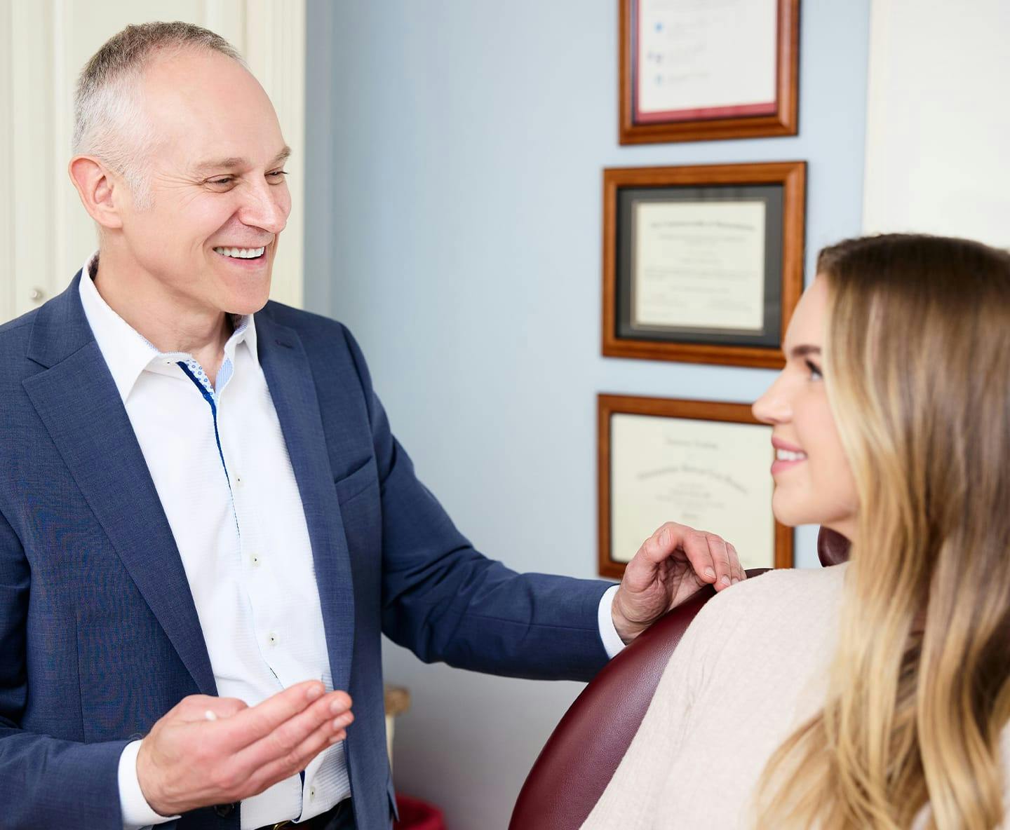 Dr. Fechner speaking with female patient