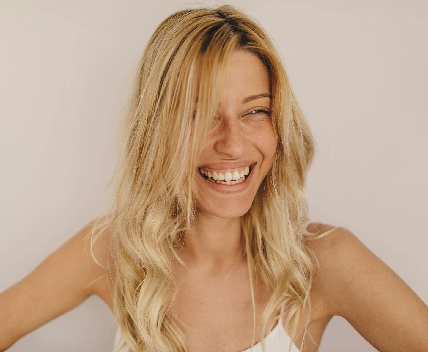 blonde woman smiling