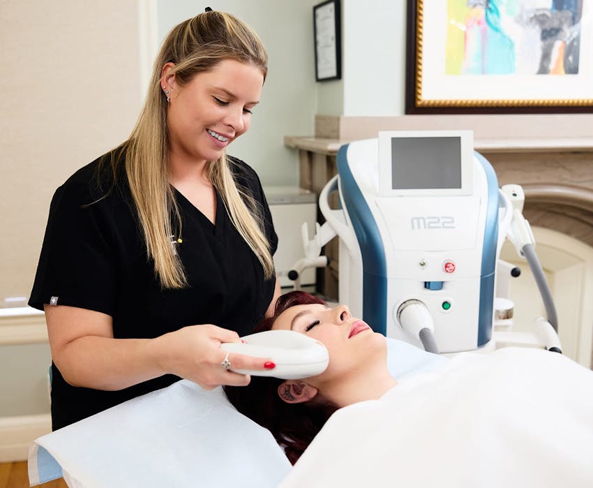 nurse working on patient