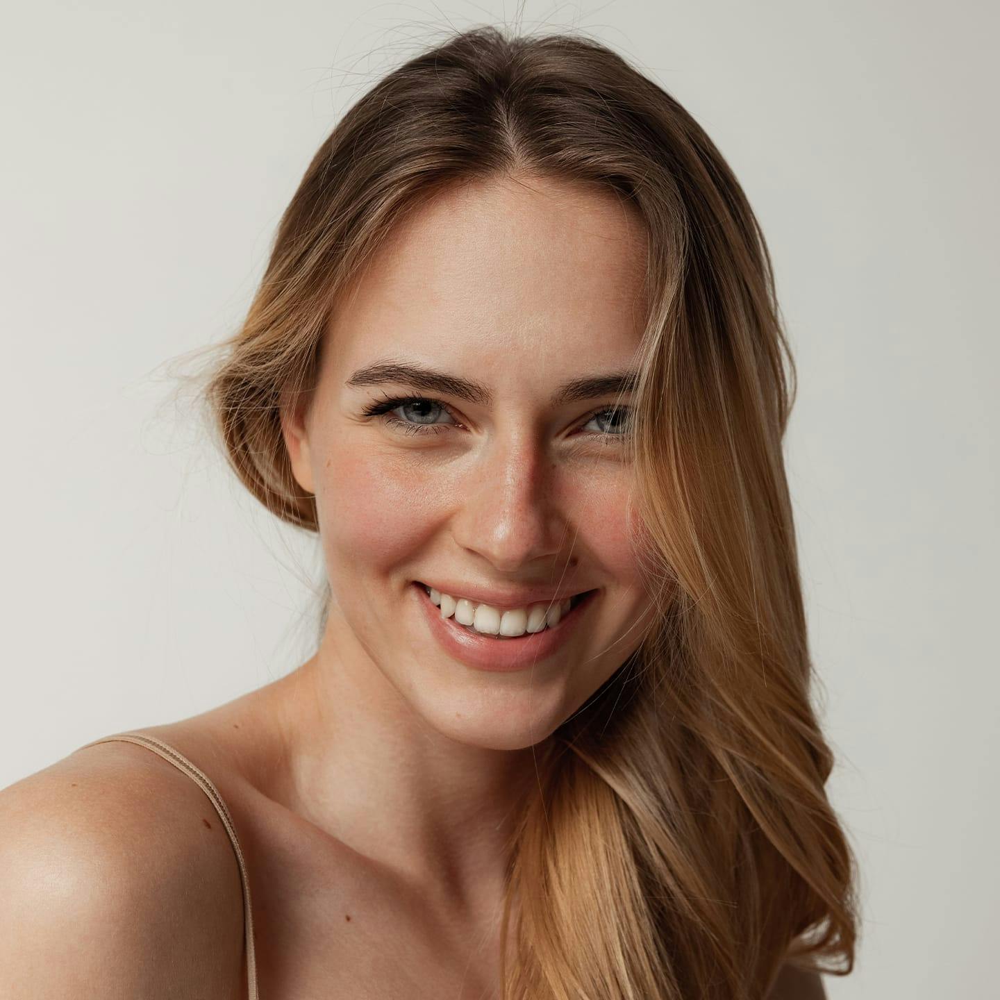 woman smiling forward