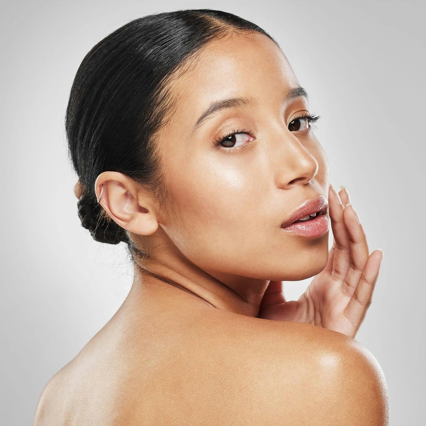 woman looking over her shoulder