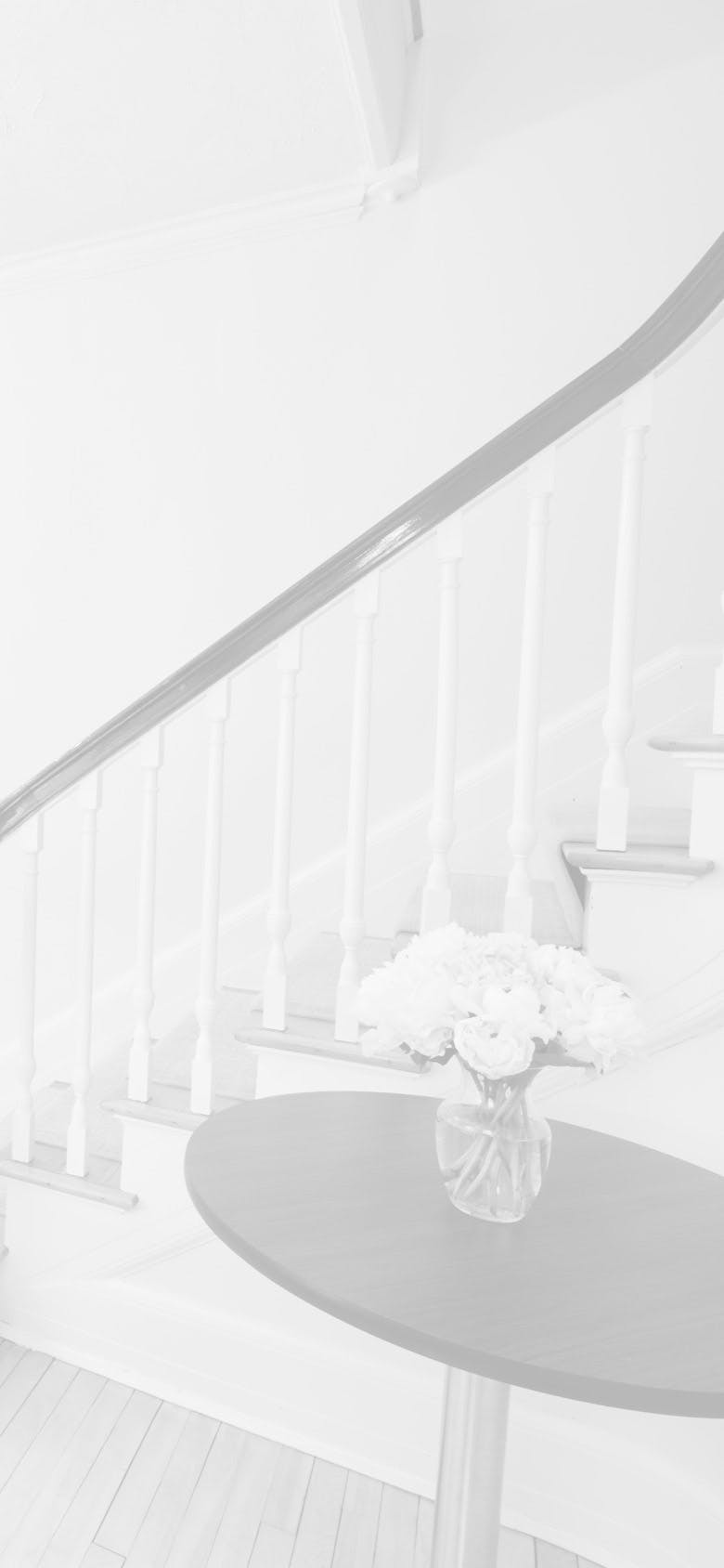 Stairway with a table in front of it
