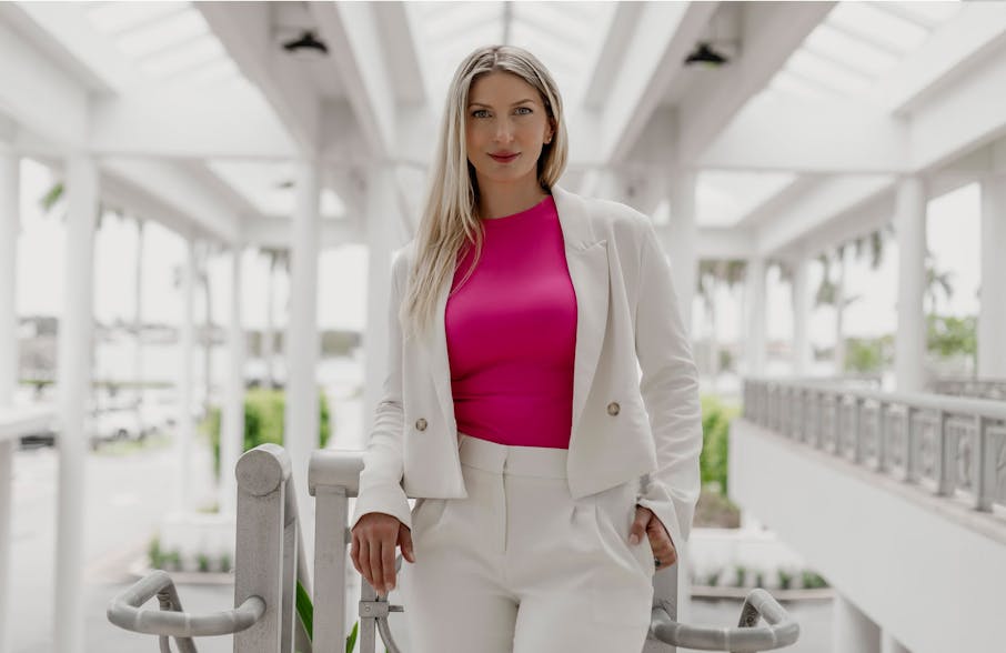 Dr. Quimby posing with white suit on