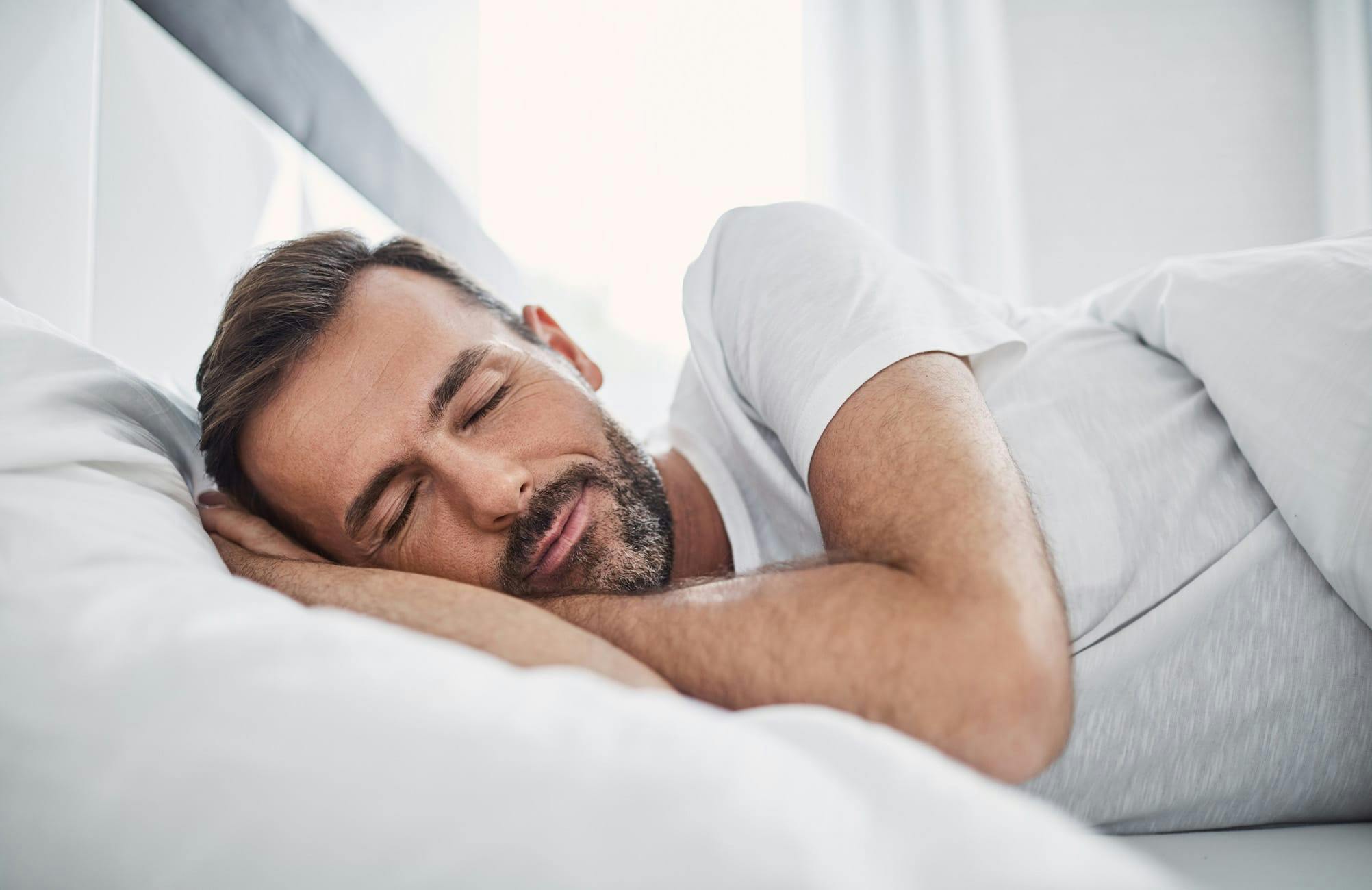 man sleeping on his side