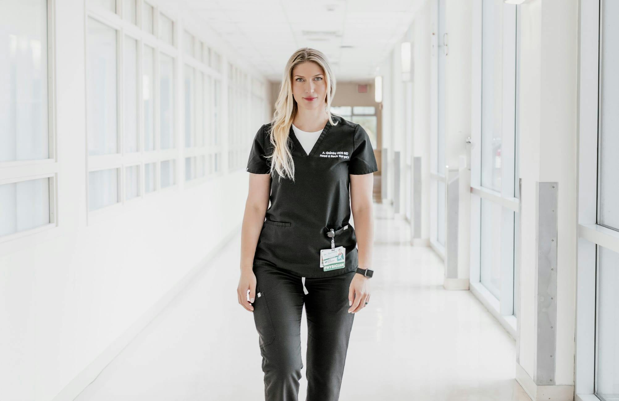 Dr. Quimby walking in hallway