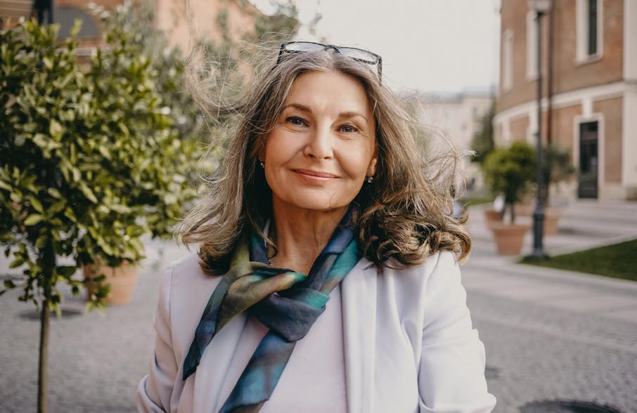 woman with scarf and glasses on her head