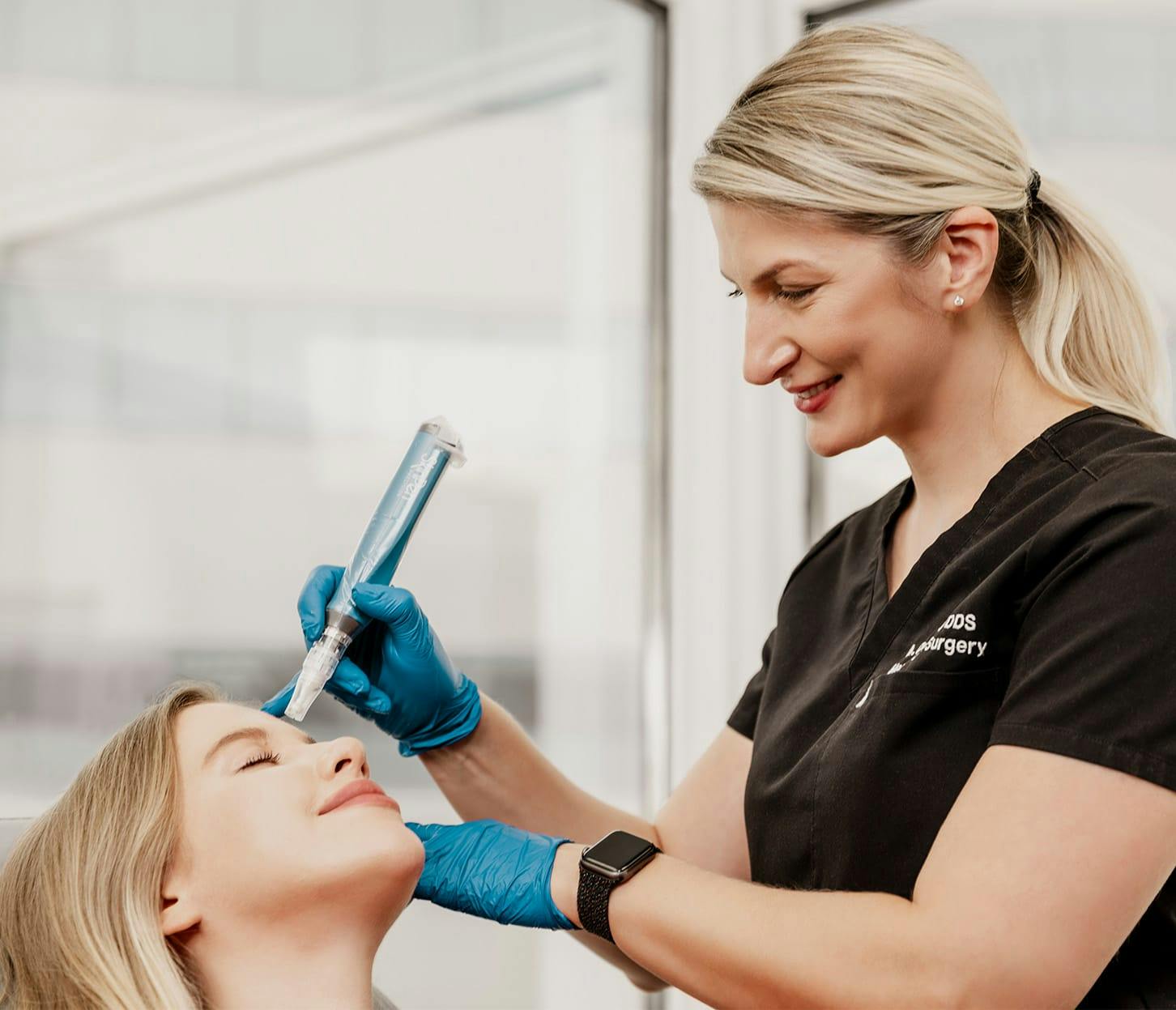 woman getting eye injection done by Dr. Quimby