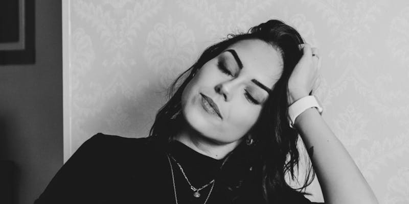 Woman touching her hair