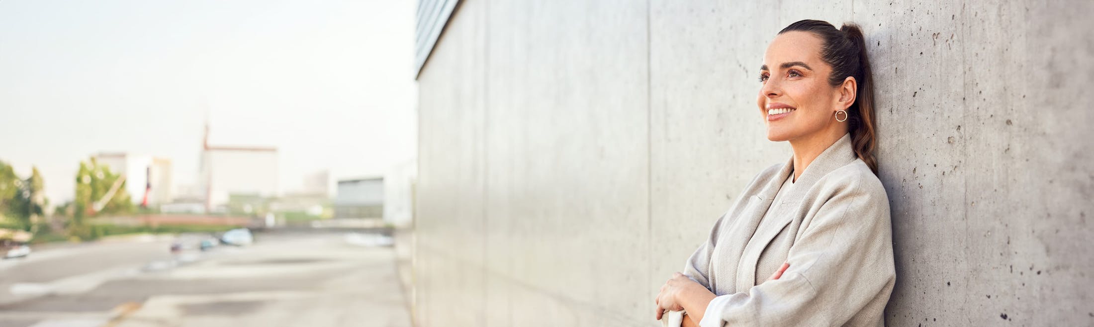 Woman leaning on wall