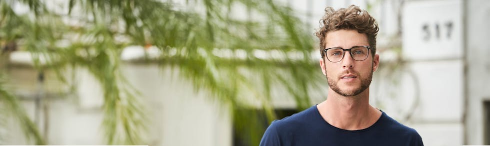 bearded man wearing glasses