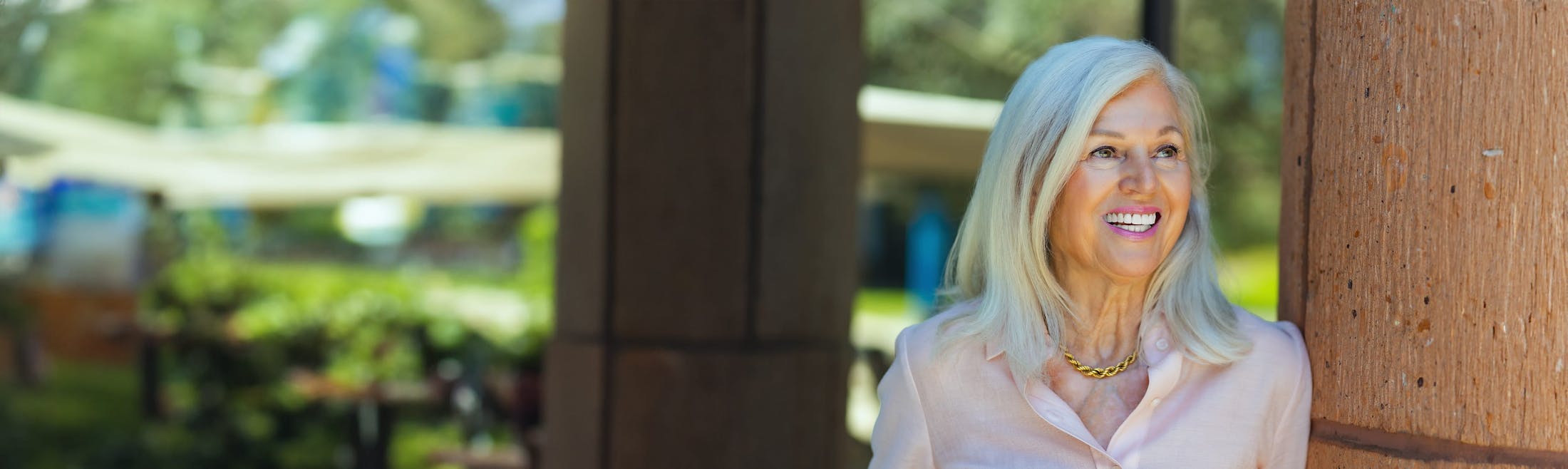 woman in white blouse outdoors