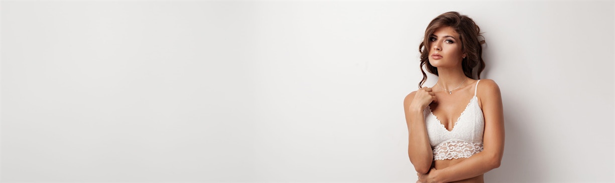 woman posing in white undergarment