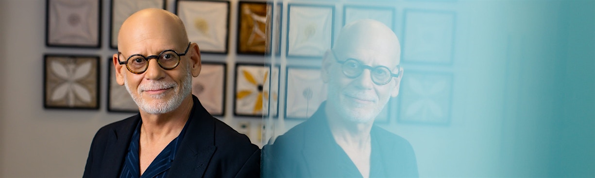 Dr. Cohen resting on wall