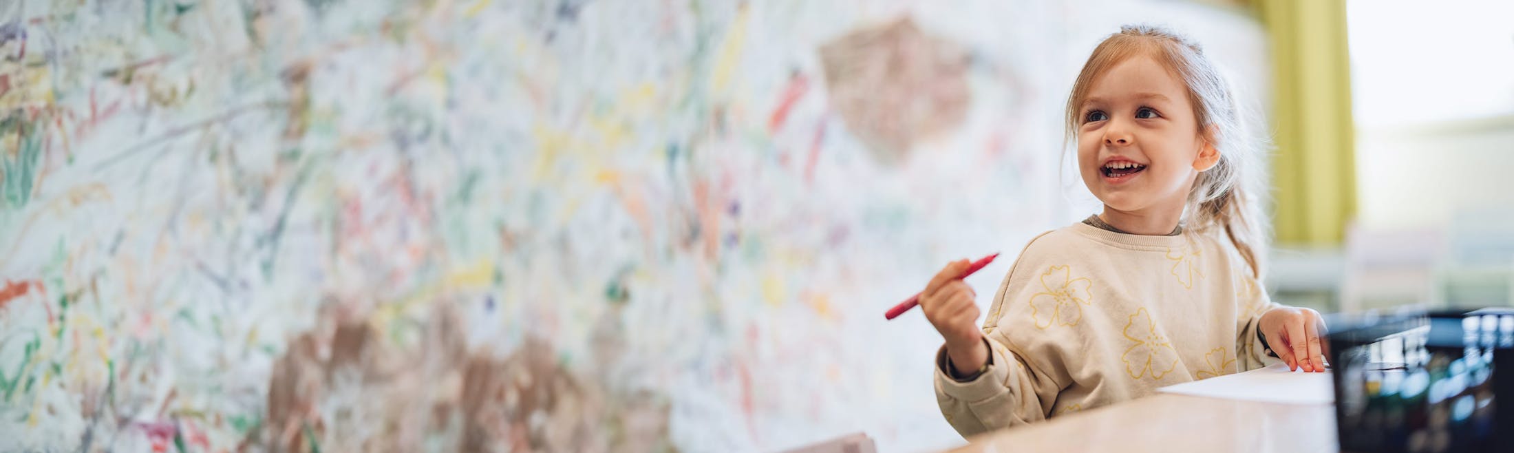 Girl holding marker