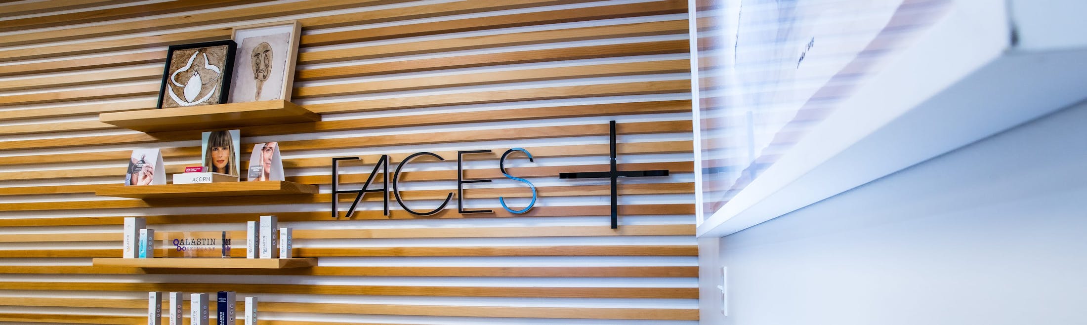 Faces+ office sign