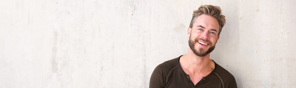 bearded man smiling
