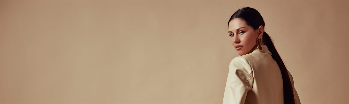 woman looking over shoulder