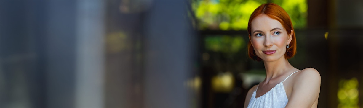 woman smiling outdoors